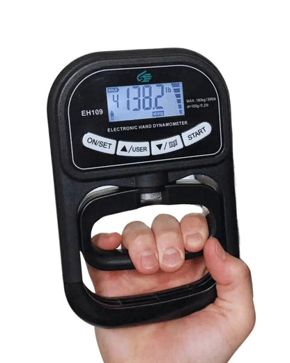 Digital hand dynamometer being used to measure grip strength on a white background
